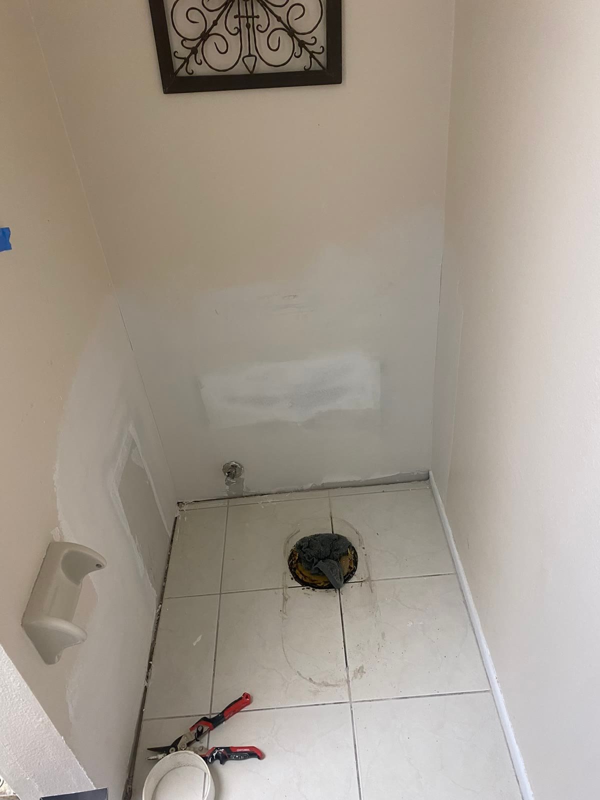 Before: mudded wall patch in bathroom